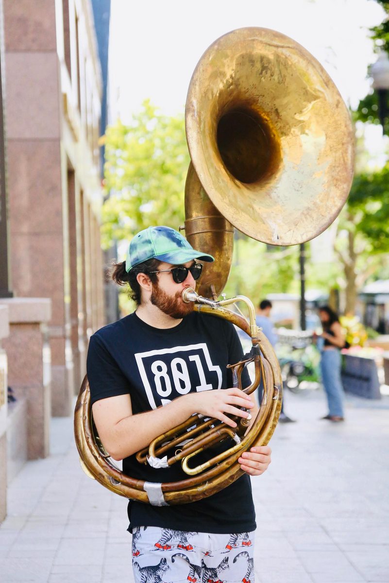 Jared Ramos playing brass on the street