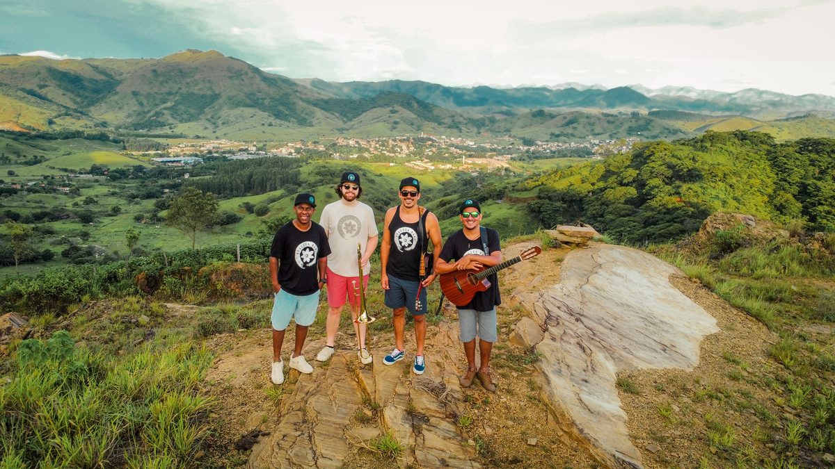 Jared Ramos and band overlooking mountains