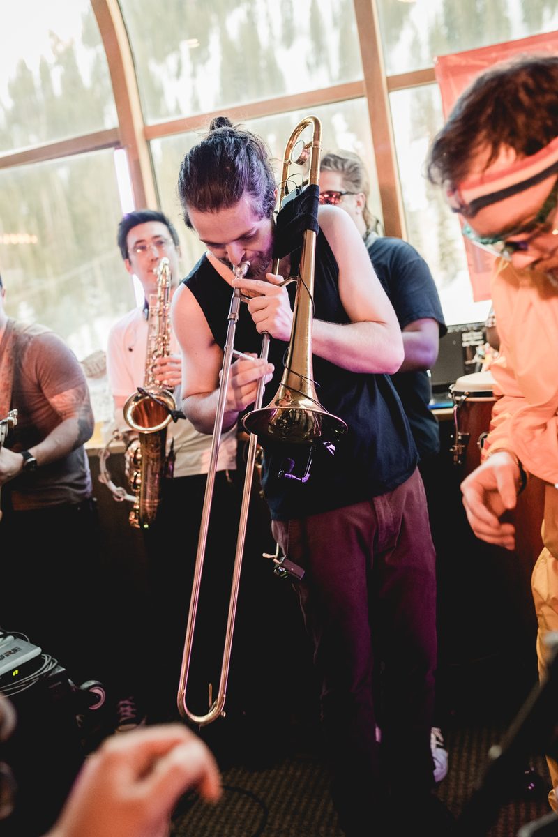 Jared Ramos performing trombone live with band